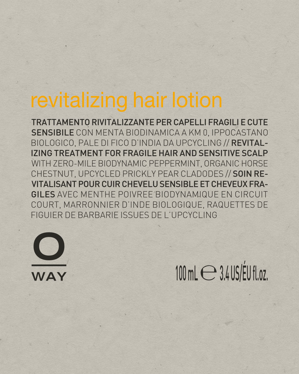 Label for revitalizing hair lotion with text and branding on a gray background mobileonly