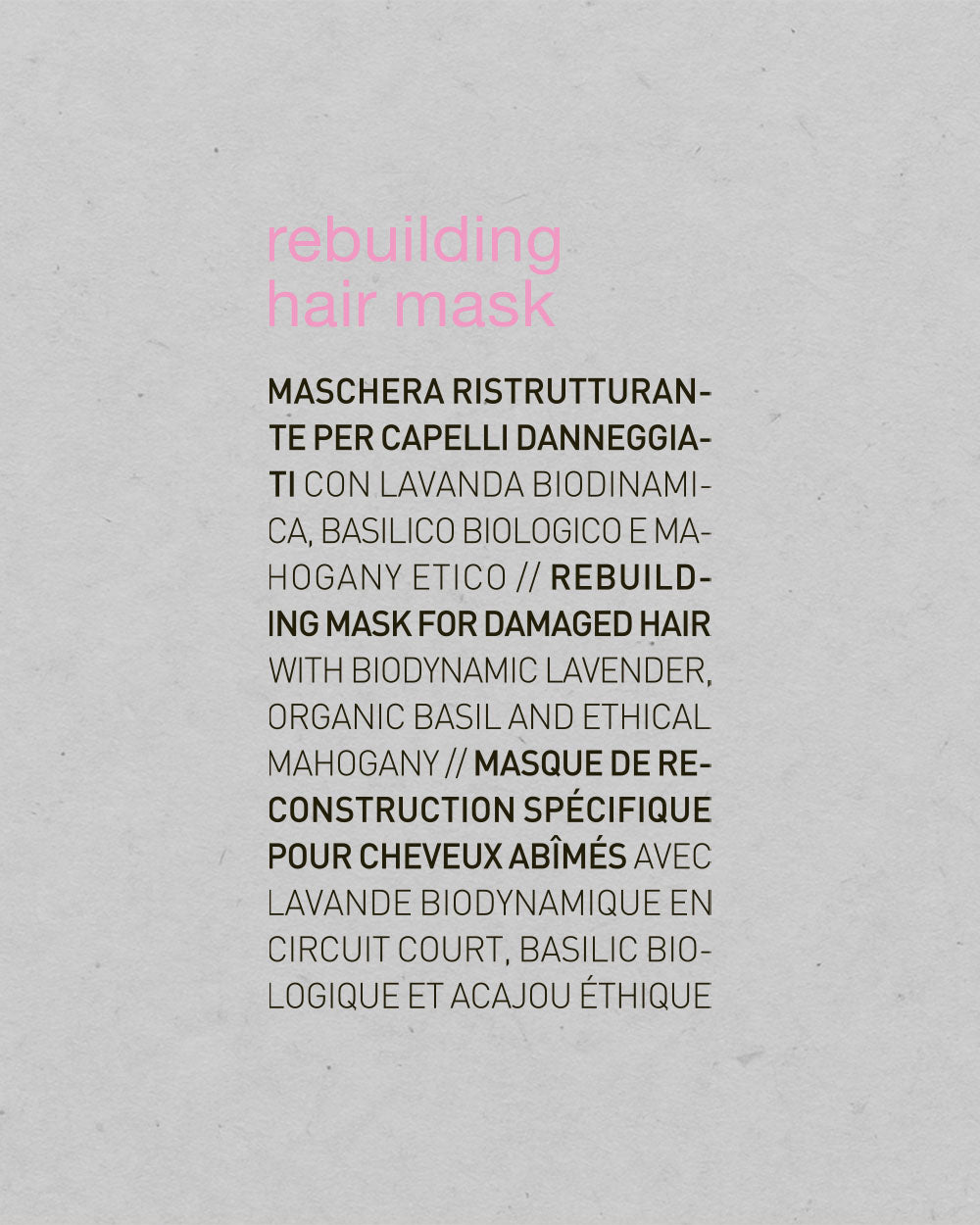 Product label for 'rebuilding hair mask' with text on a gray background mobileonly