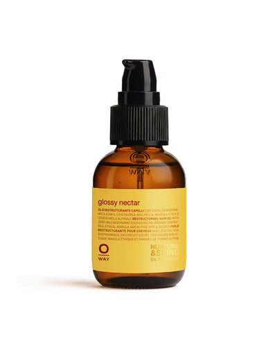 Brown bottle with black pump and yellow label on a white background